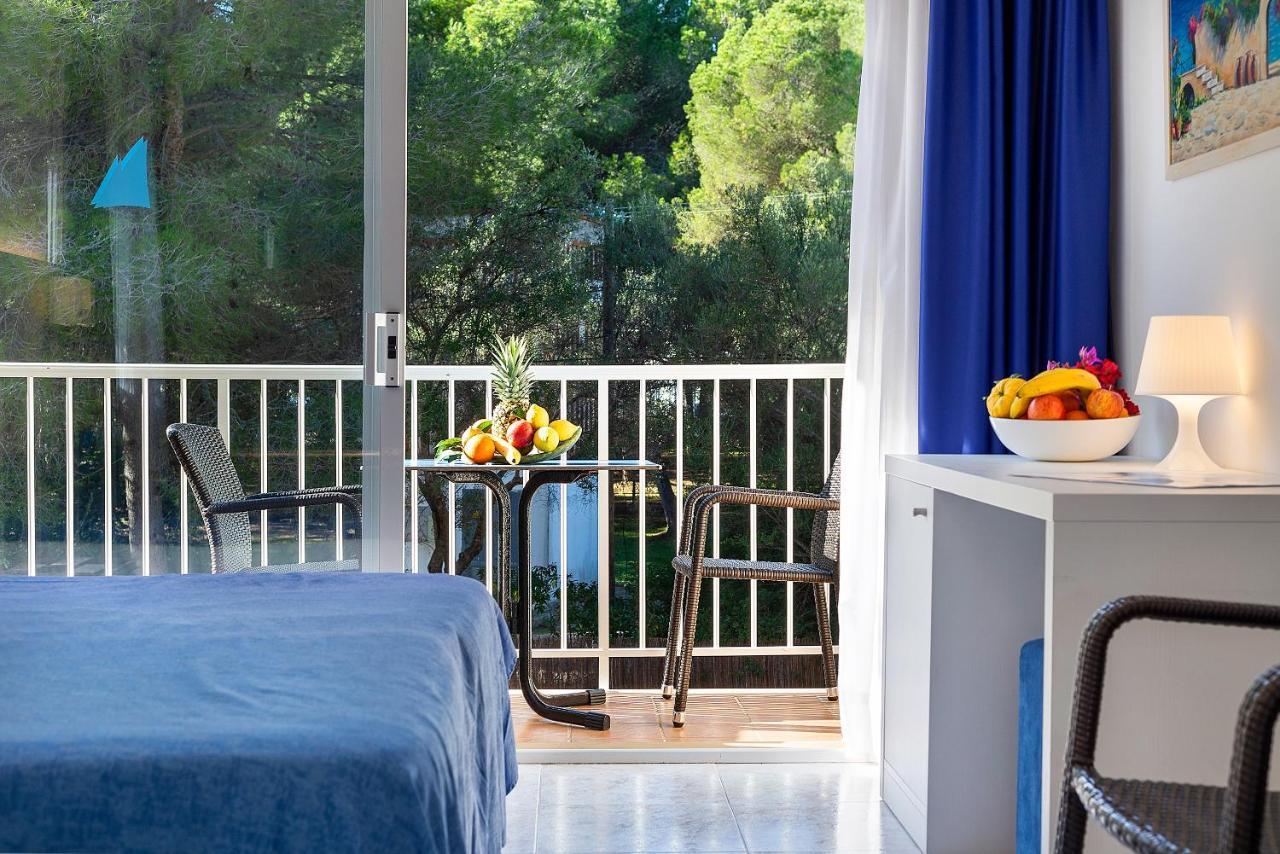 Apartamentos Cala Murada Minigolf Extérieur photo